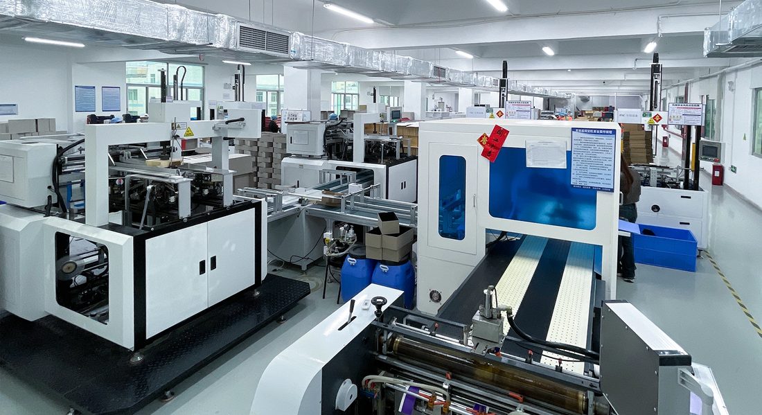 Rigid box and carton making line