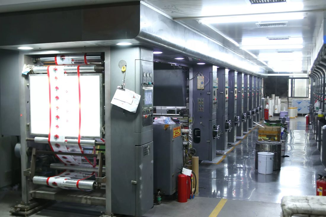 Multi-station rotogravure printing press